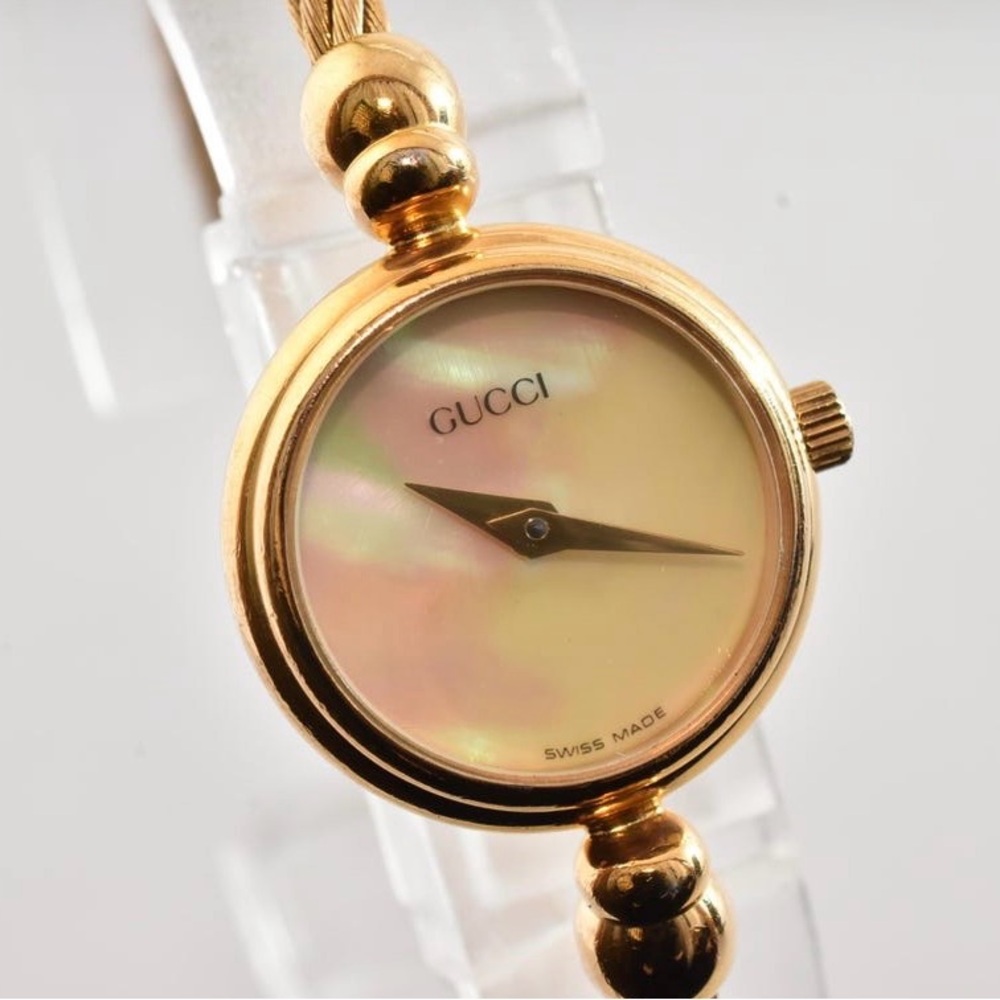 Gucci Women's Gold Watch with Mother of Pearl Dial